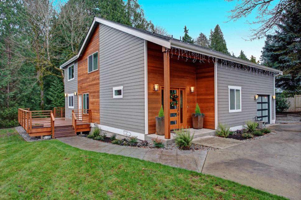 Renovated home exterior with composite wood siding.