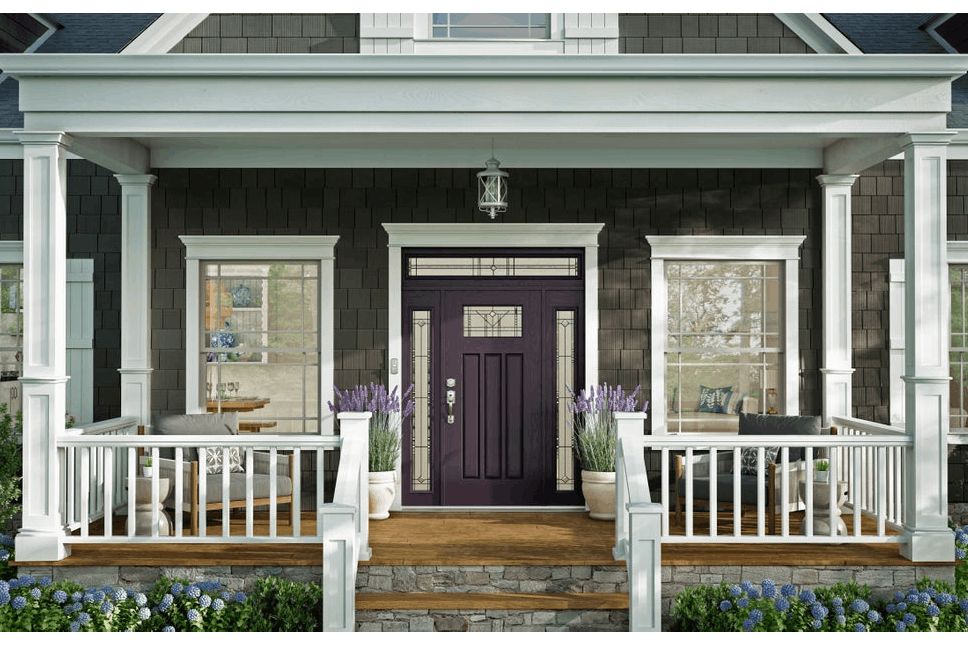 Front porch of a home with white windows.