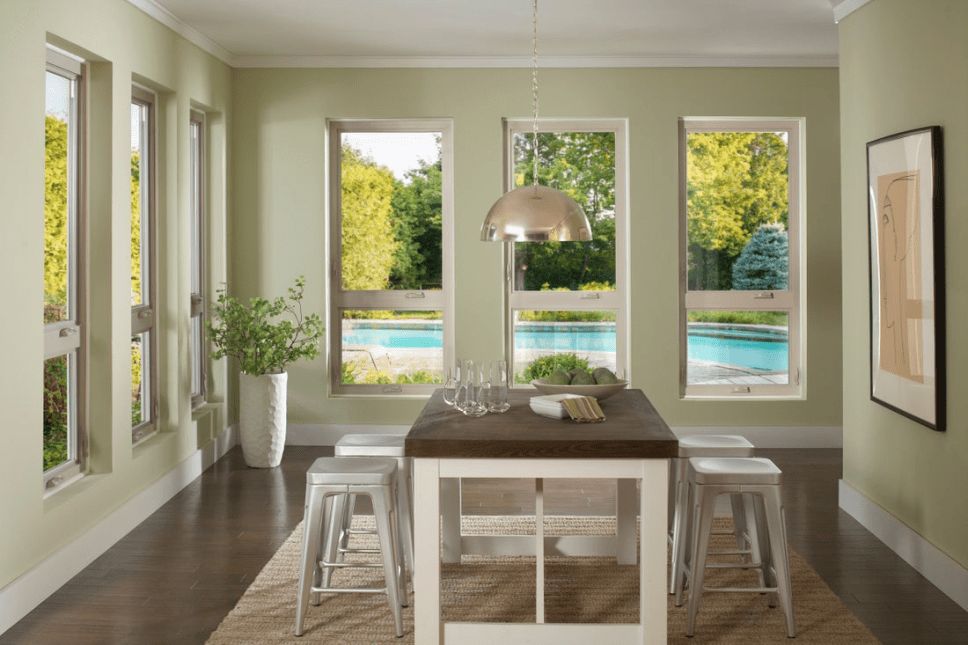 Interior of a home with multiple similar casement and awning windows.